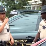 Georgia officers hunt for suspect in taking pictures that killed two and injured 35